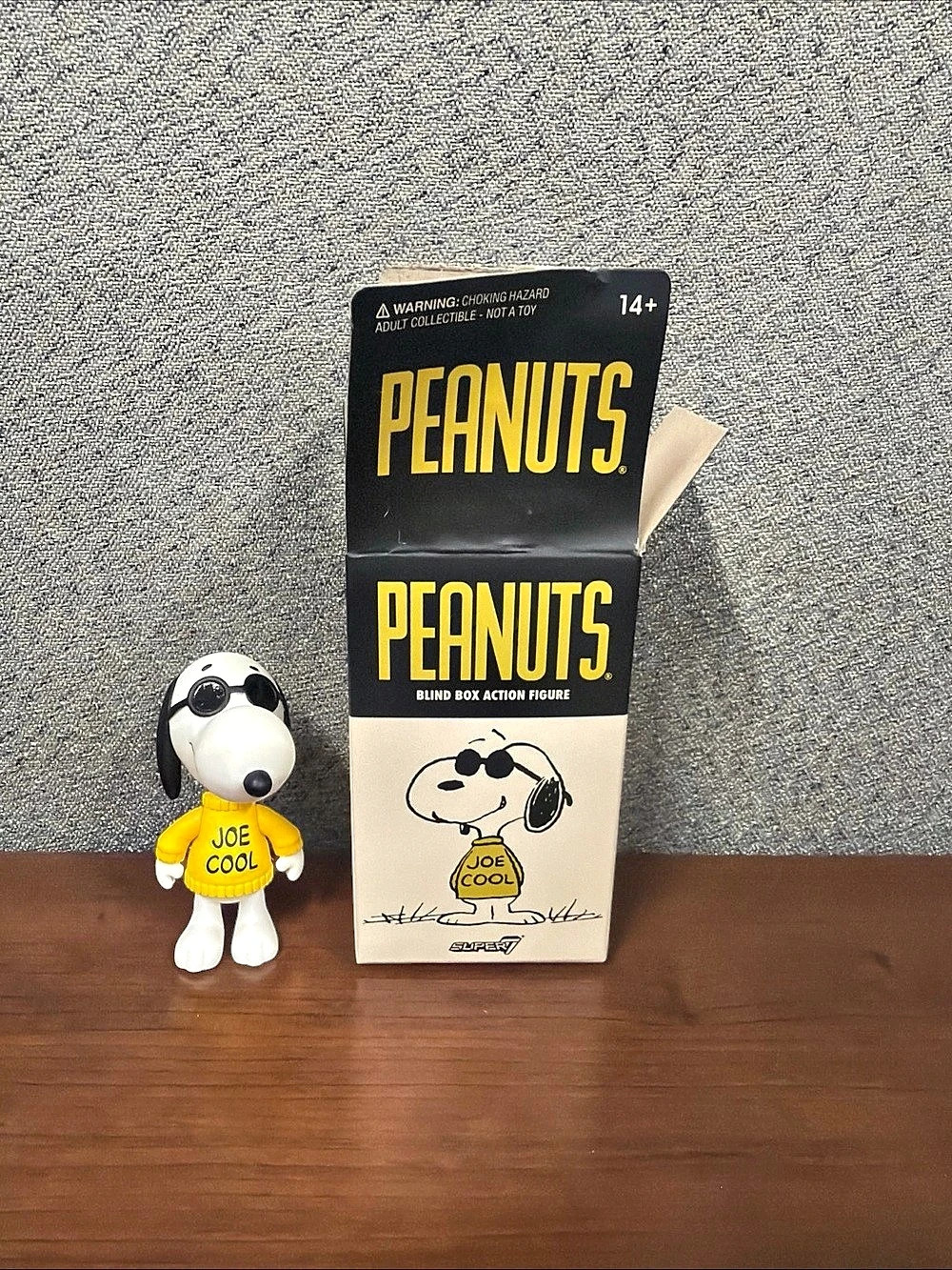 Peanuts Joe Cool blind box action figure in Yellow & Black